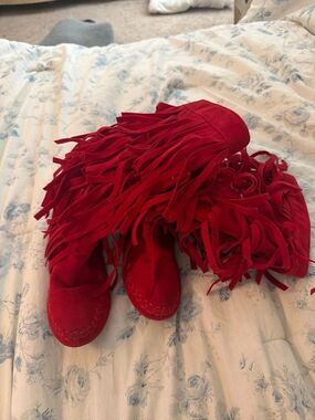 Red fringe faux suede boots